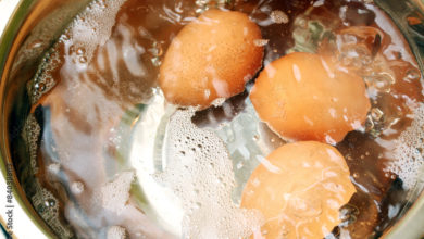 Why do you add some salt to water when boiling eggs?